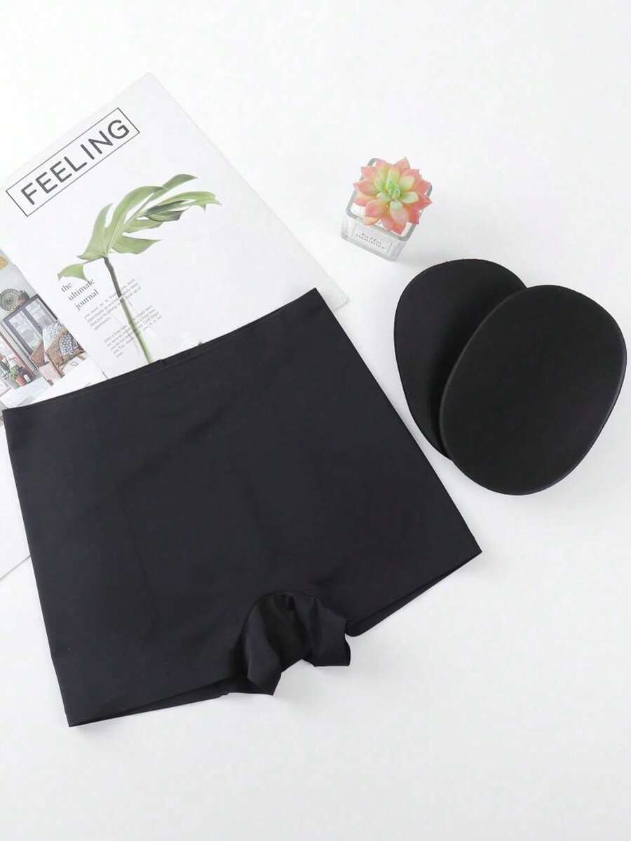 Women's high waist seamless tummy control panties with hip enhancer padding in apricot.
