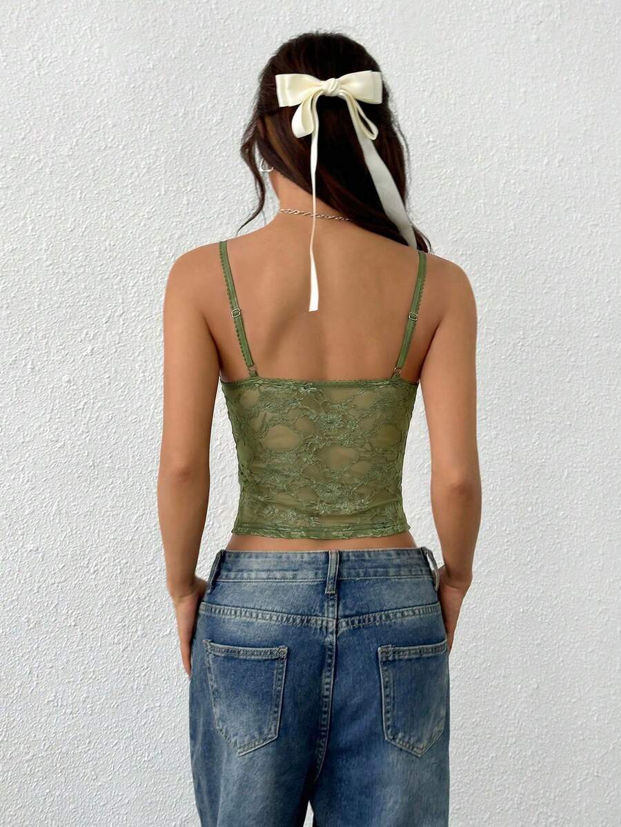 Women's white lace crop camisole top featuring spaghetti straps and slim fit design.