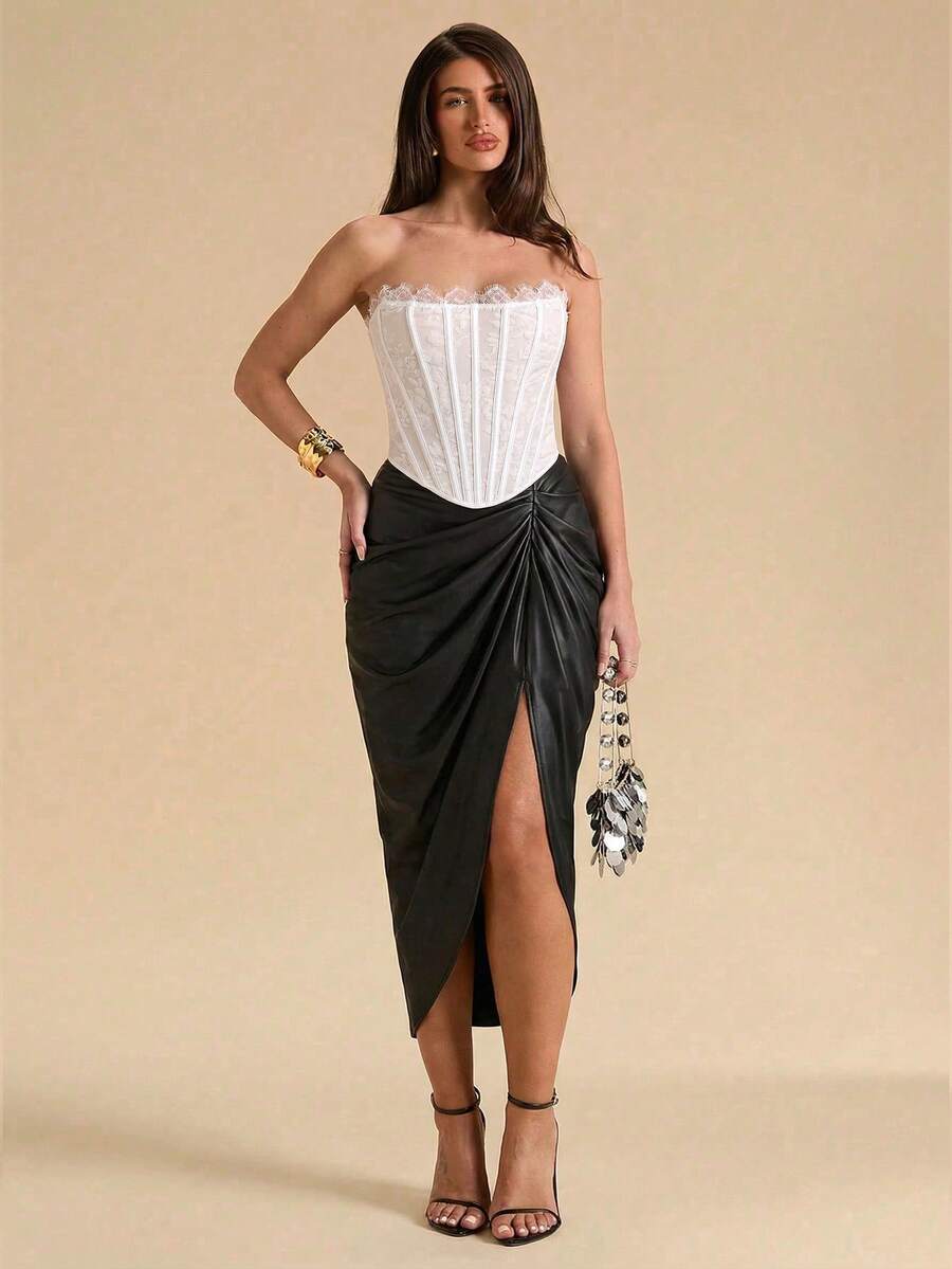 Women's strapless bustier crop top with contrast lace, lace-up detail, and an asymmetric hem in a slim-fit satin finish.