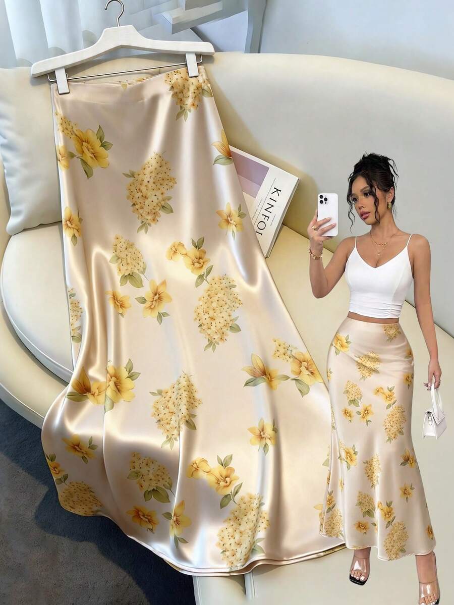Women's elegant black A-line long skirt featuring a plain woven fabric, regular fit, natural mid-waist style, and flared hem design suitable for formal and evening wear.