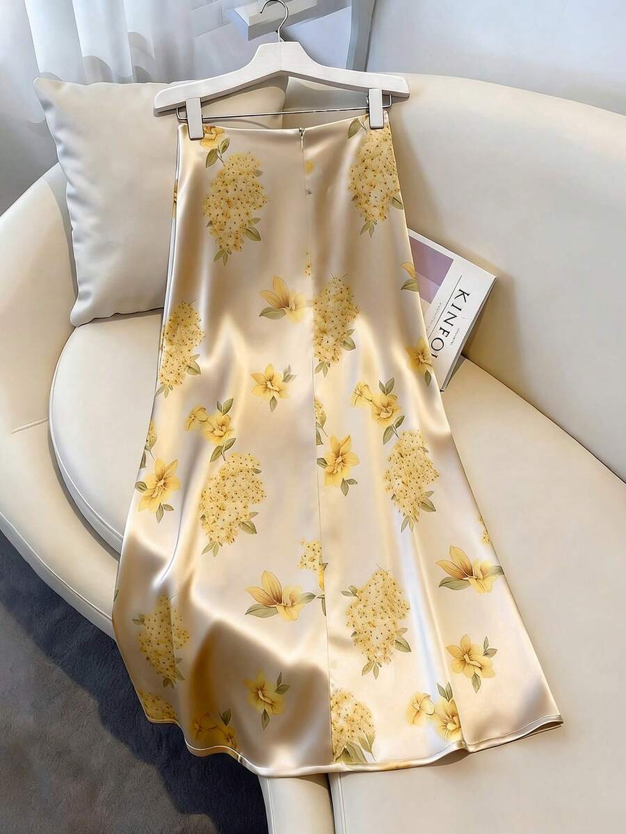 Women's elegant black A-line long skirt featuring a plain woven fabric, regular fit, natural mid-waist style, and flared hem design suitable for formal and evening wear.