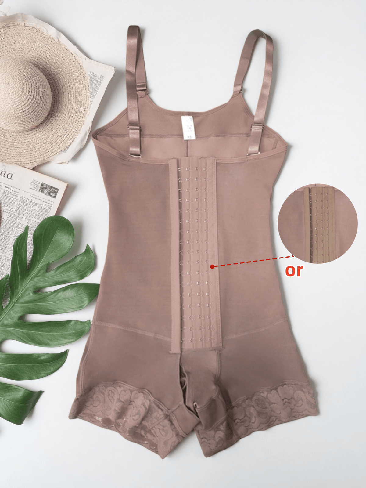 Women's apricot body shaper jumpsuit with 4-row hook and eye front closure and contrast lace details.