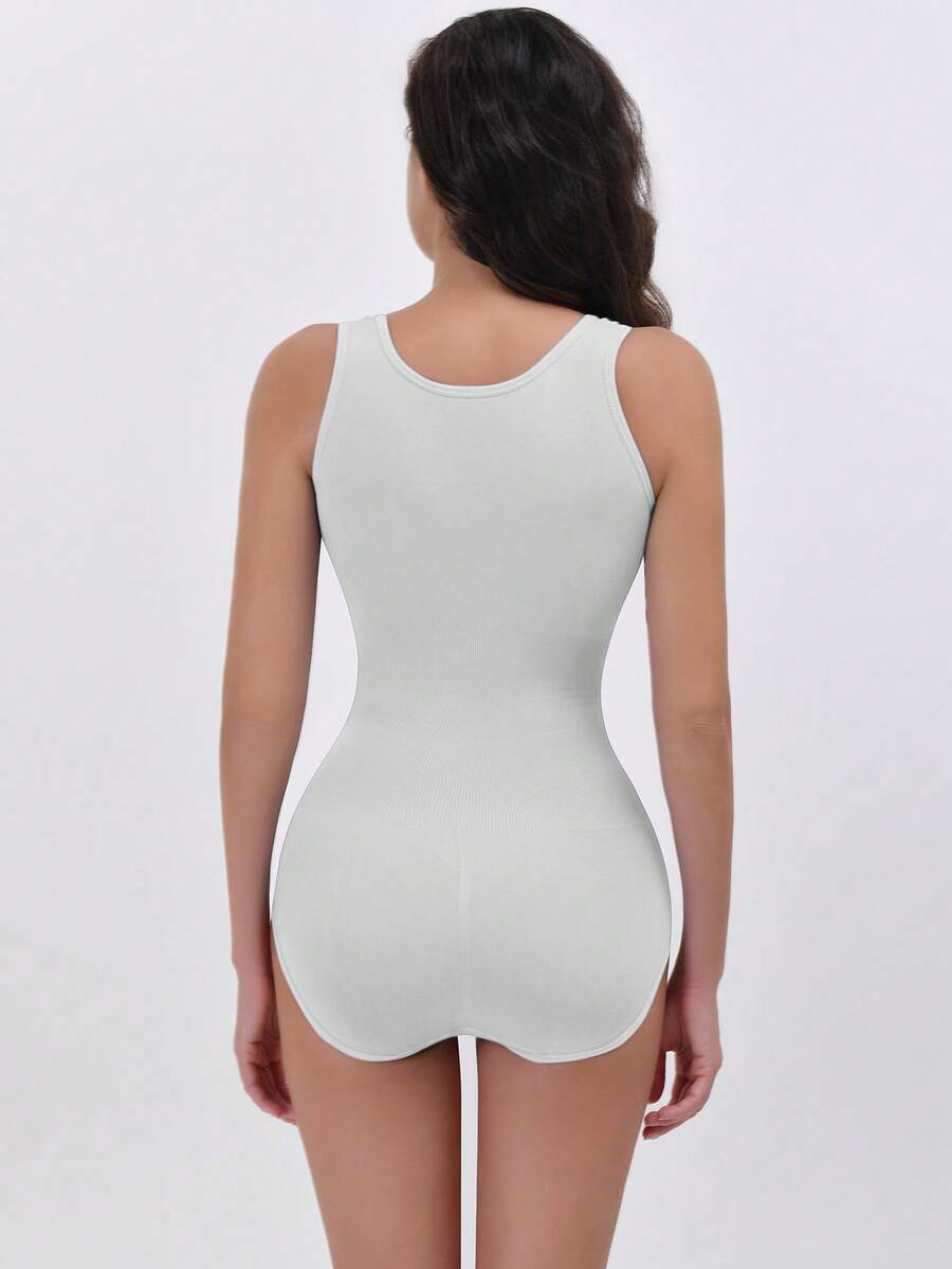 Apricot women's shapewear bodysuit featuring wide shoulder straps, tummy control, waist tightening, and adjustable three-row buckle