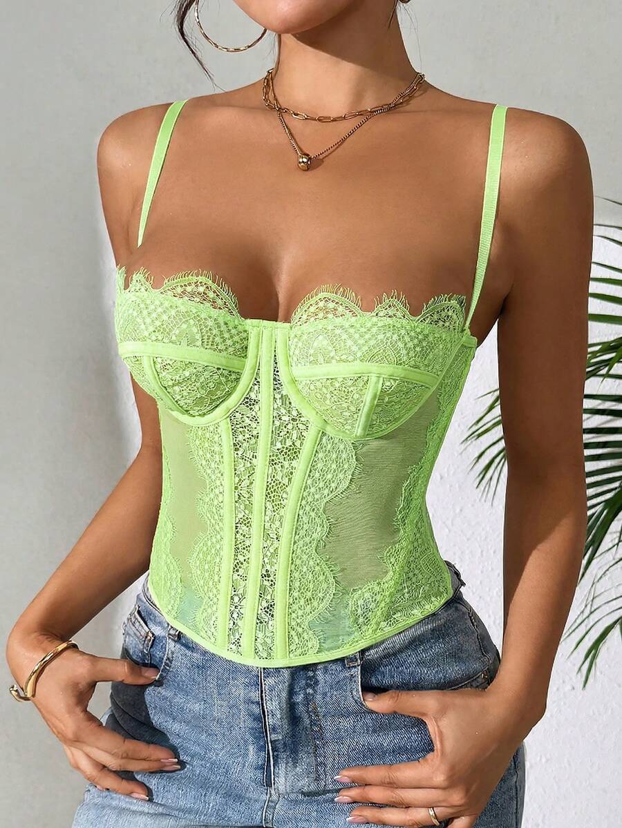 Women's brown lace trim cami corset crop top featuring a low cut neck, unlined body, and slim fit bodycon silhouette.