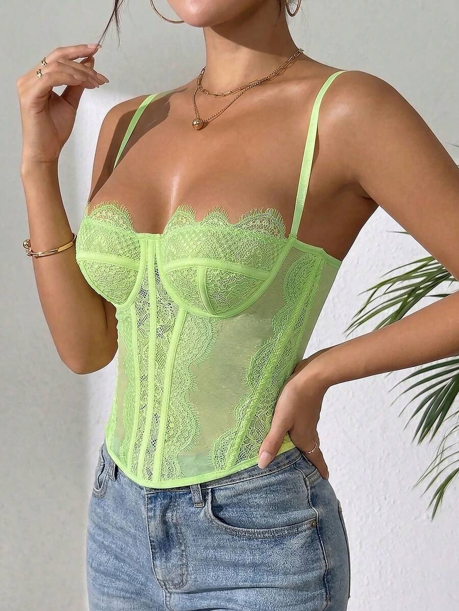 Women's brown lace trim cami corset crop top featuring a low cut neck, unlined body, and slim fit bodycon silhouette.