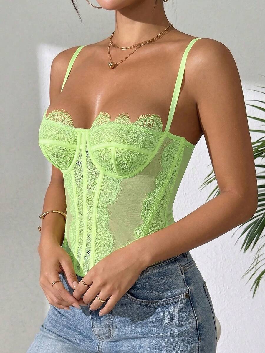 Women's brown lace trim cami corset crop top featuring a low cut neck, unlined body, and slim fit bodycon silhouette.