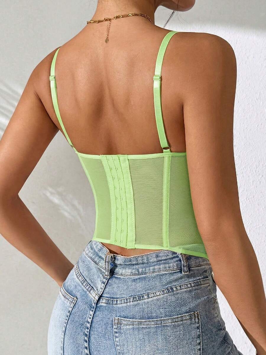 Women's brown lace trim cami corset crop top featuring a low cut neck, unlined body, and slim fit bodycon silhouette.