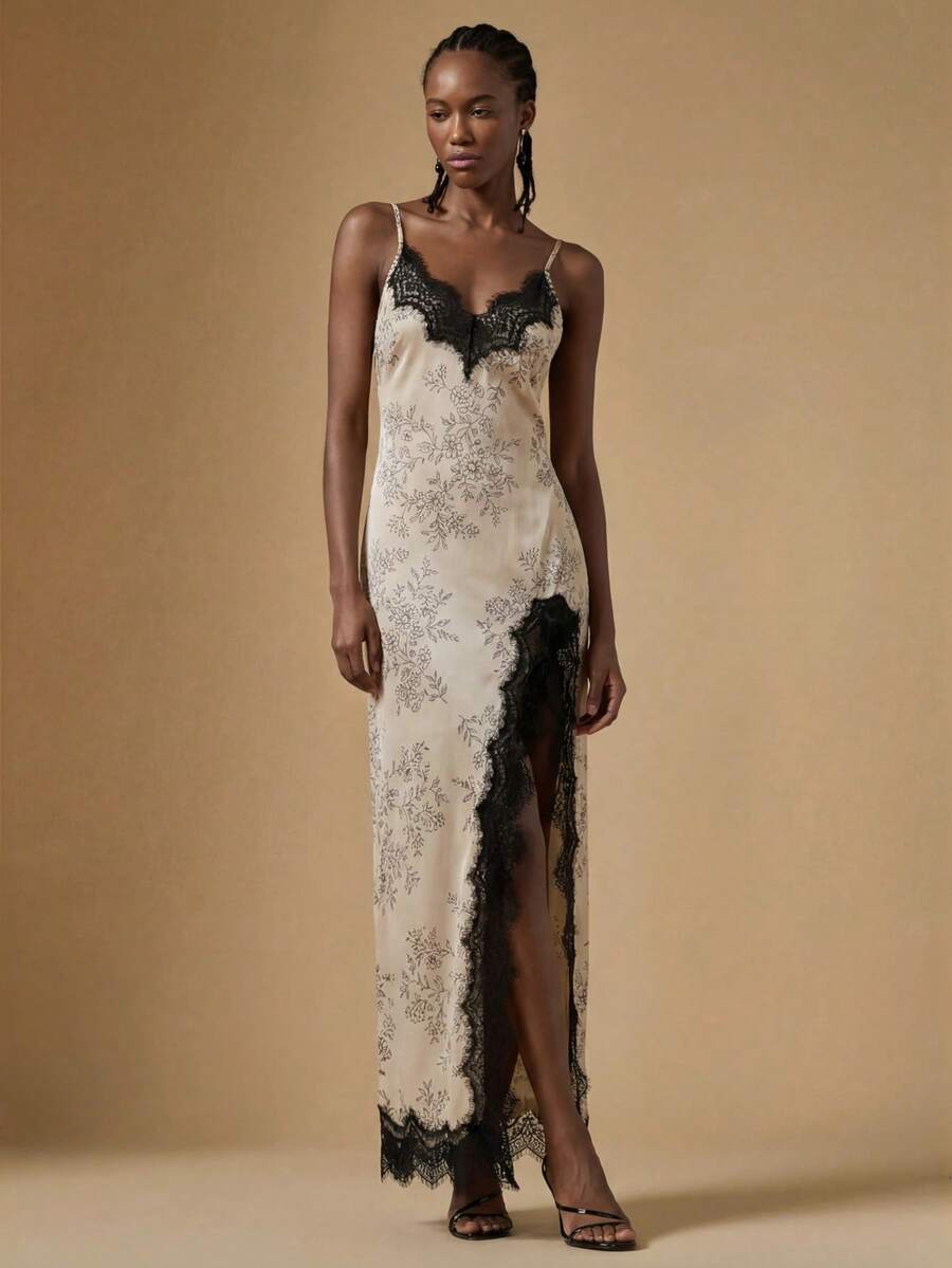 Women's black lace split satin long dress featuring spaghetti straps, asymmetrical slit hem, and matching arm sleeves.