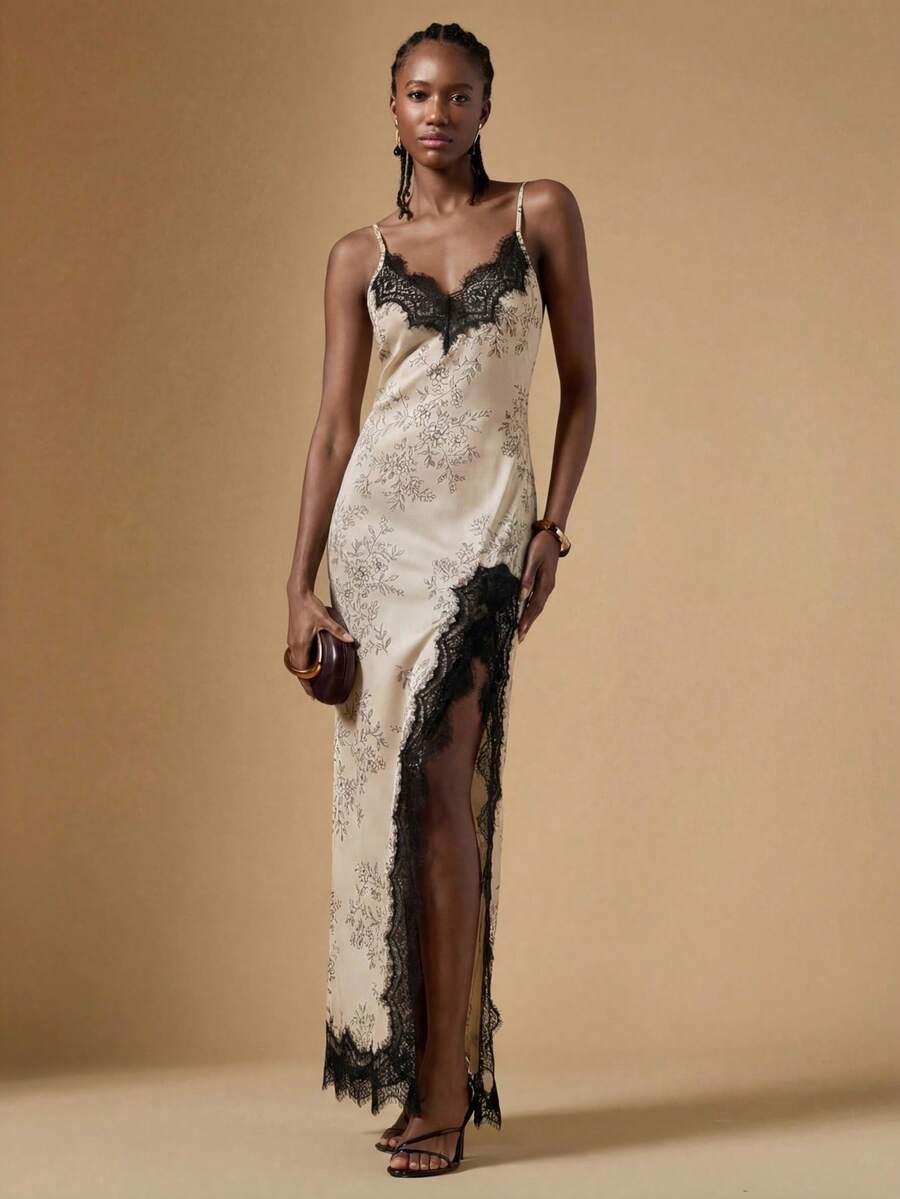 Women's black lace split satin long dress featuring spaghetti straps, asymmetrical slit hem, and matching arm sleeves.