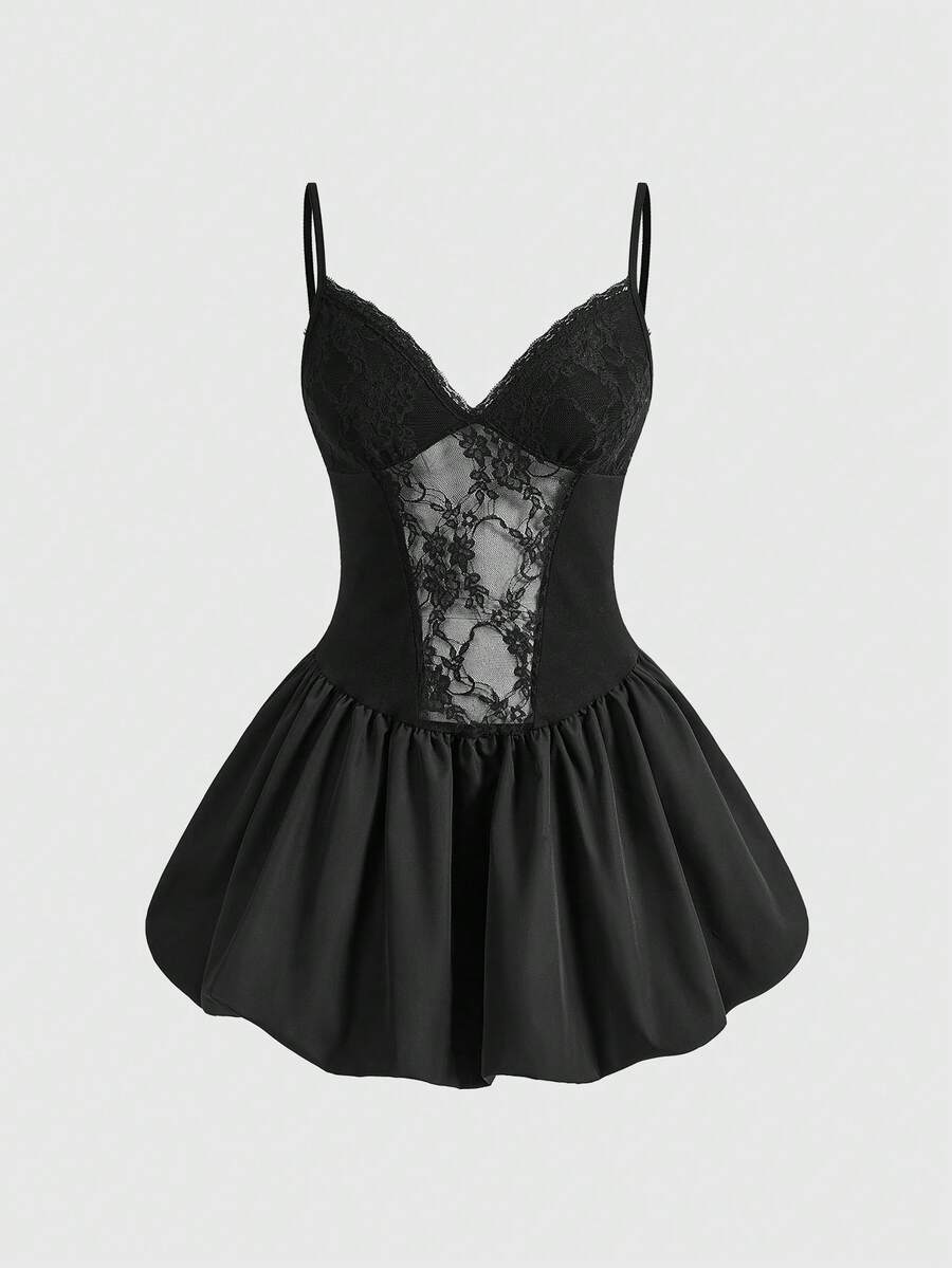 Black lace goth mini dress with spaghetti straps, contrast lace trim, high waist, and flared hem.