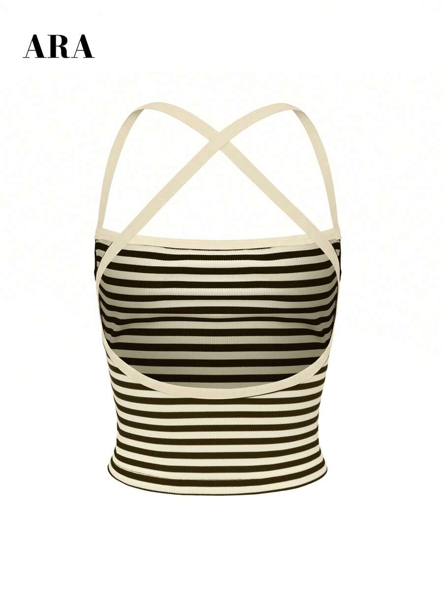 Burgundy ribbed cami tank top with criss-cross backless design and slim fit cropped silhouette.
