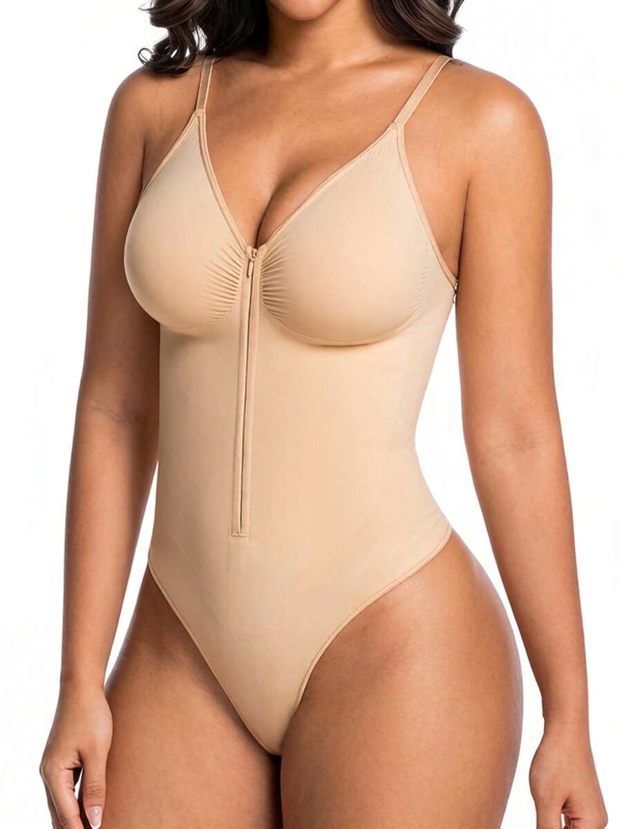Women's V-neck camisole shapewear bodysuit featuring a front zipper closure, ruched detail, and waist shaping control.