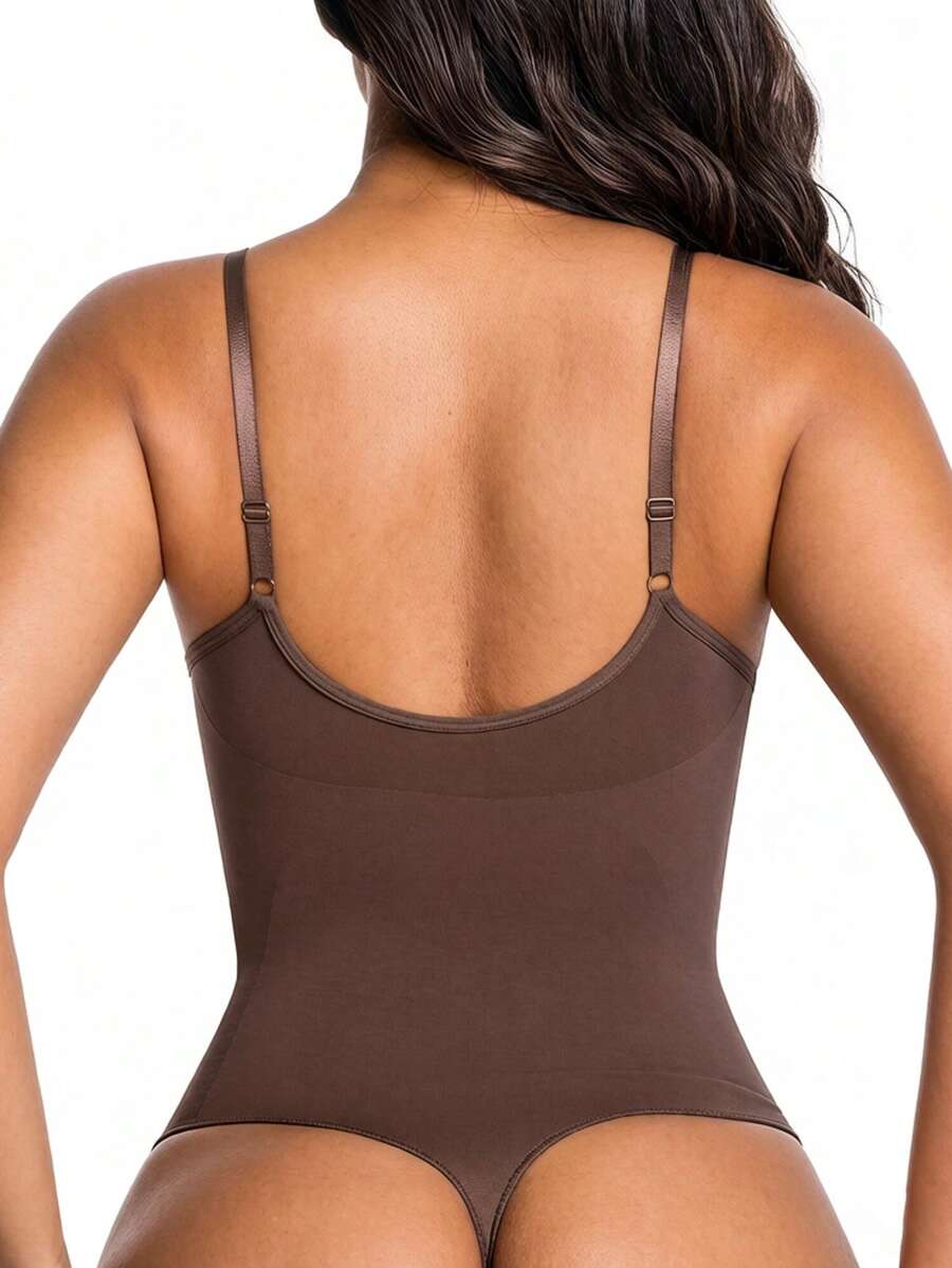 Women's V-neck camisole shapewear bodysuit featuring a front zipper closure, ruched detail, and waist shaping control.