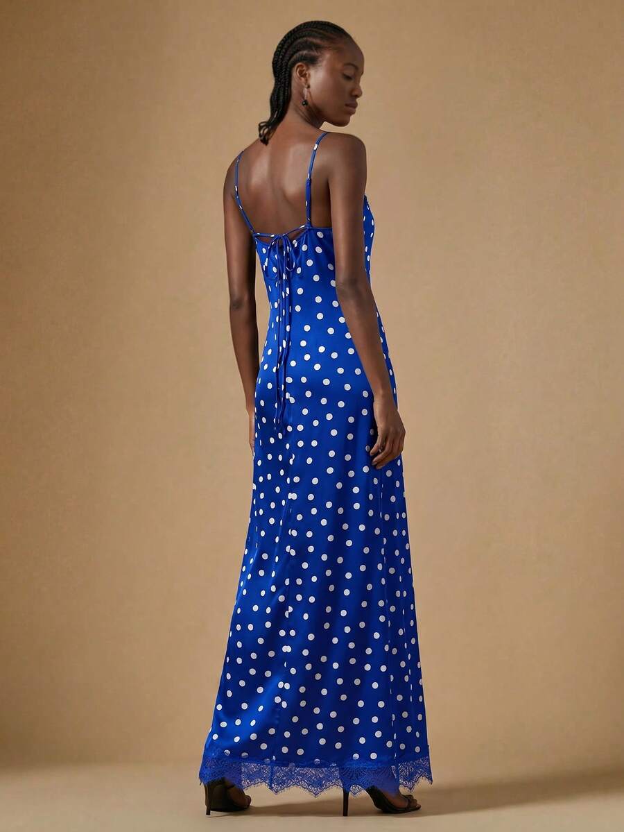Women's black lace split satin long dress featuring spaghetti straps, asymmetrical slit hem, and matching arm sleeves.
