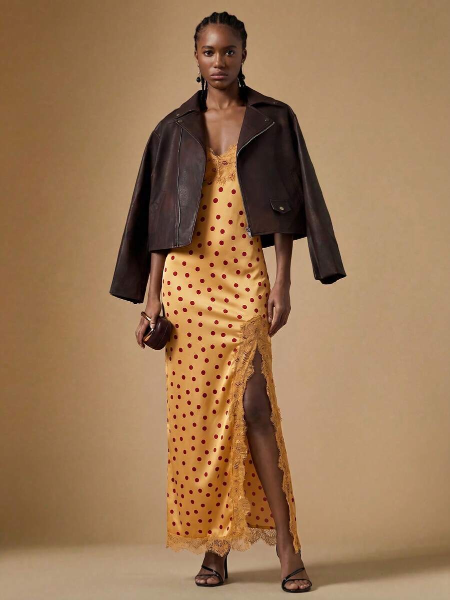 Women's black lace split satin long dress featuring spaghetti straps, asymmetrical slit hem, and matching arm sleeves.