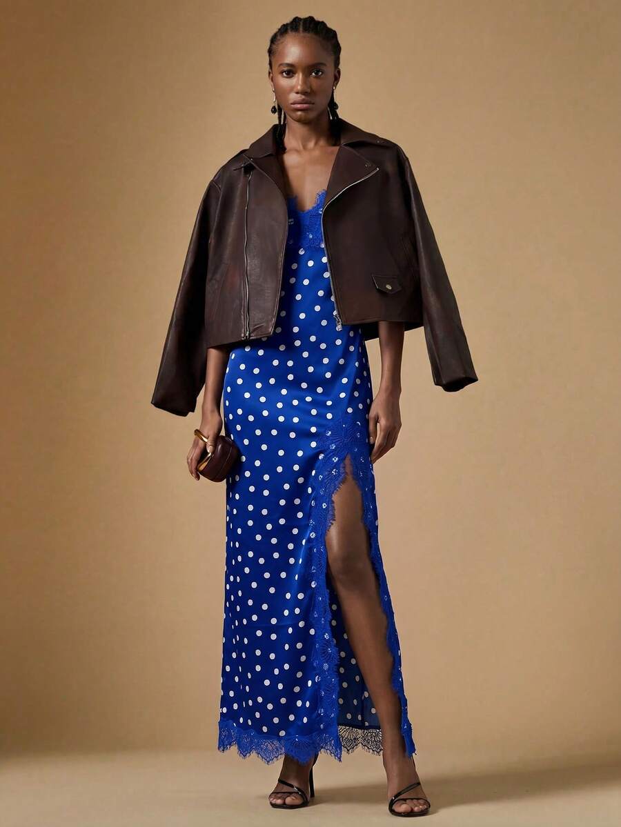 Women's black lace split satin long dress featuring spaghetti straps, asymmetrical slit hem, and matching arm sleeves.
