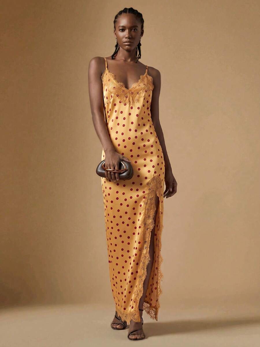 Women's black lace split satin long dress featuring spaghetti straps, asymmetrical slit hem, and matching arm sleeves.