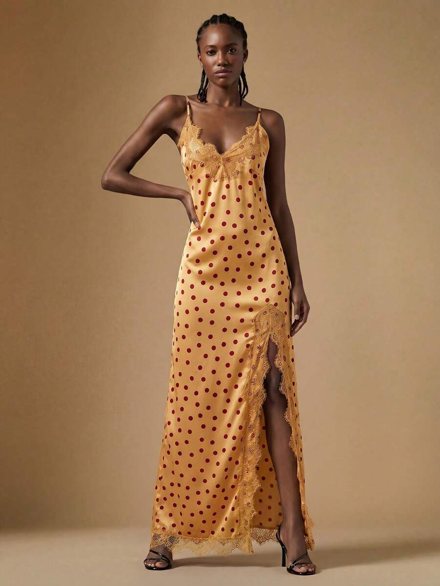 Women's black lace split satin long dress featuring spaghetti straps, asymmetrical slit hem, and matching arm sleeves.