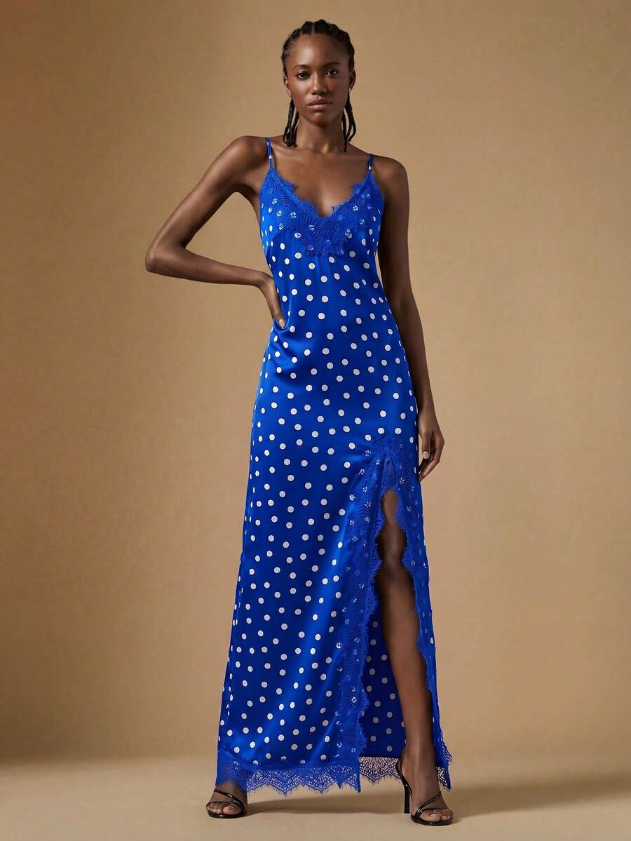 Women's black lace split satin long dress featuring spaghetti straps, asymmetrical slit hem, and matching arm sleeves.