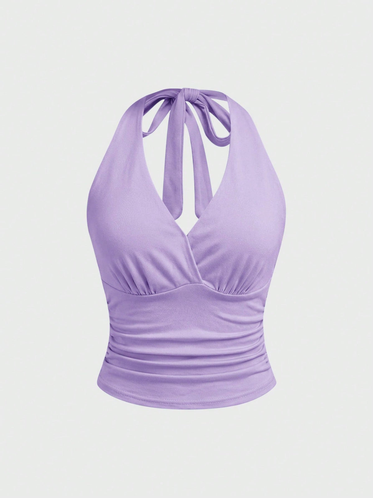 Women's halter crop tank top featuring a backless silhouette and ruched detailing in a slim fit design.
