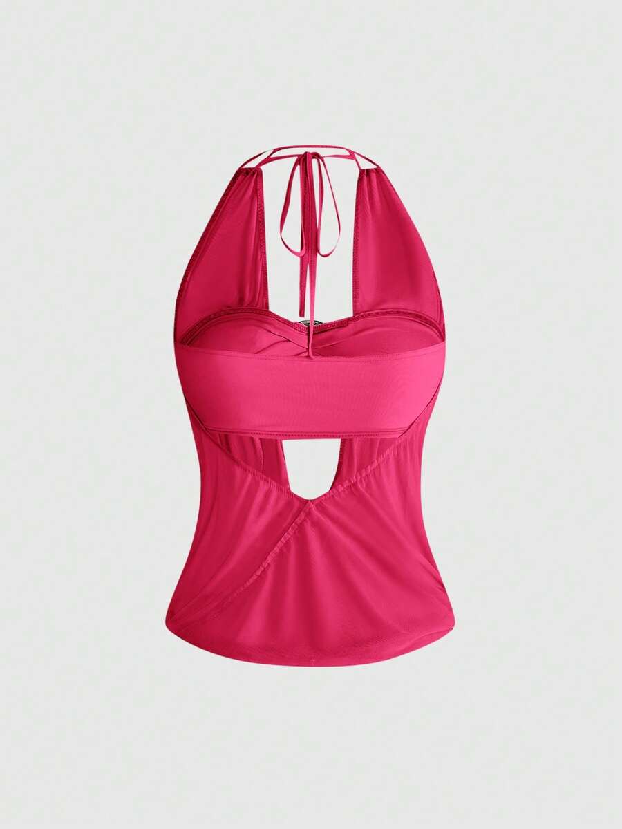 Women's cowl neck halter crop tank top featuring a draped backless design and matching bandeau inner layer.