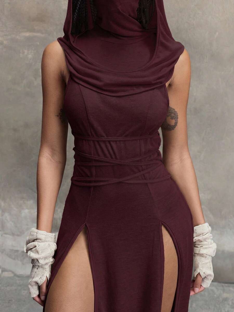 Women wearing a Y2K vintage apocalyptic style hooded long dress featuring short sleeves, backless detail, high thigh slit, and slim fit knitted fabric.