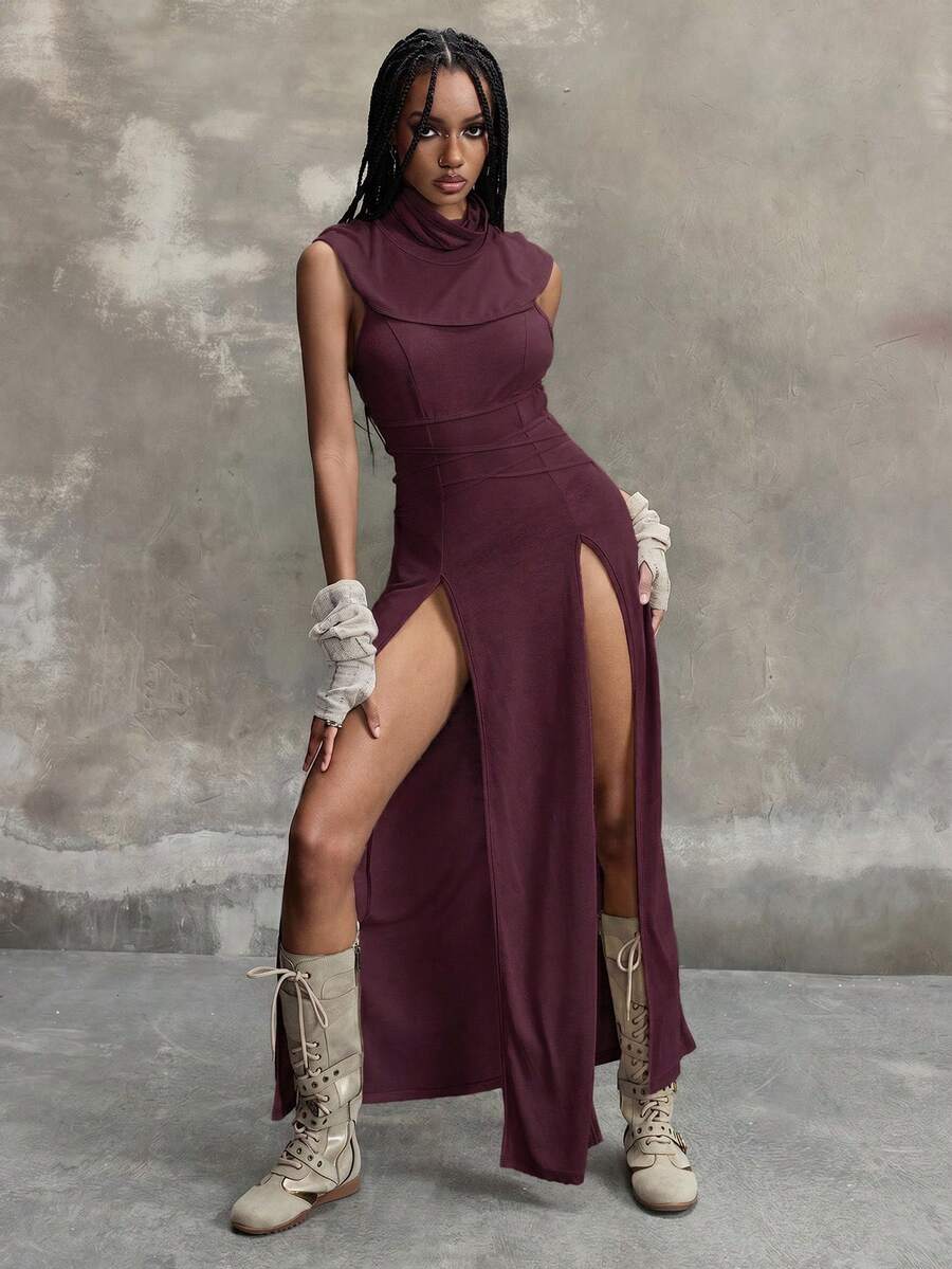 Women wearing a Y2K vintage apocalyptic style hooded long dress featuring short sleeves, backless detail, high thigh slit, and slim fit knitted fabric.