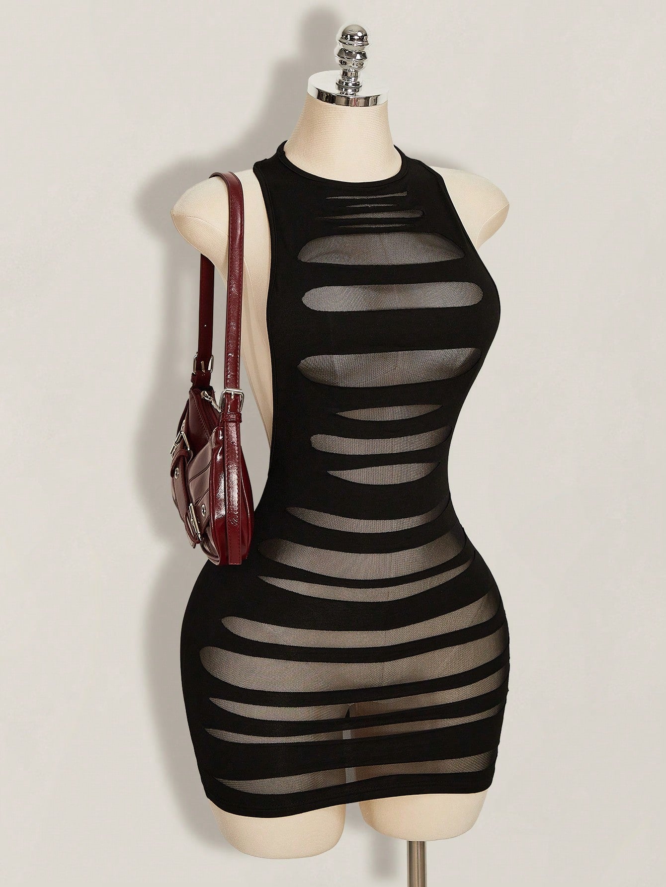 Apricot criss-cross backless bodycon mini dress for women featuring a round neck and rhinestone accent details.