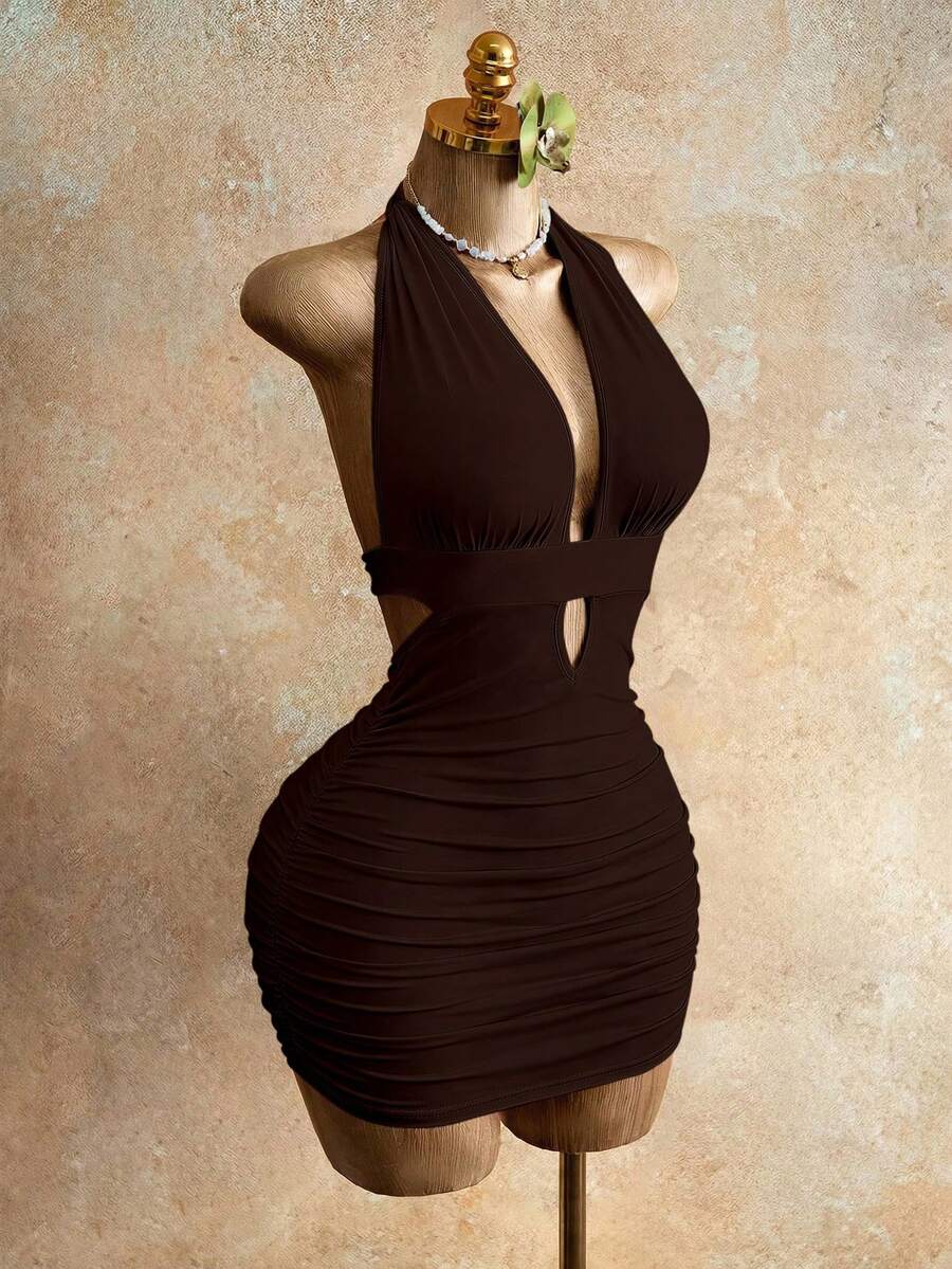 Sleeveless women's halter backless bodycon mini dress featuring lace-up knot back details and a high-waist pencil hem.