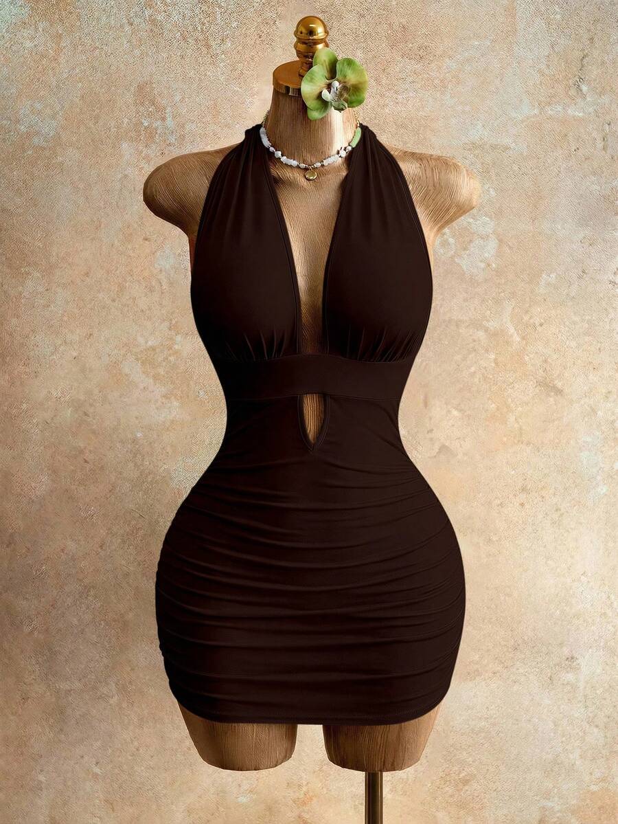 Sleeveless women's halter backless bodycon mini dress featuring lace-up knot back details and a high-waist pencil hem.