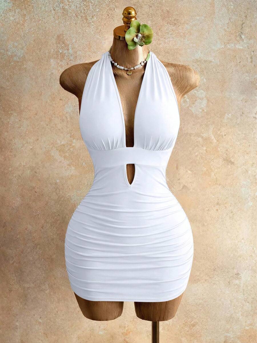 Sleeveless women's halter backless bodycon mini dress featuring lace-up knot back details and a high-waist pencil hem.
