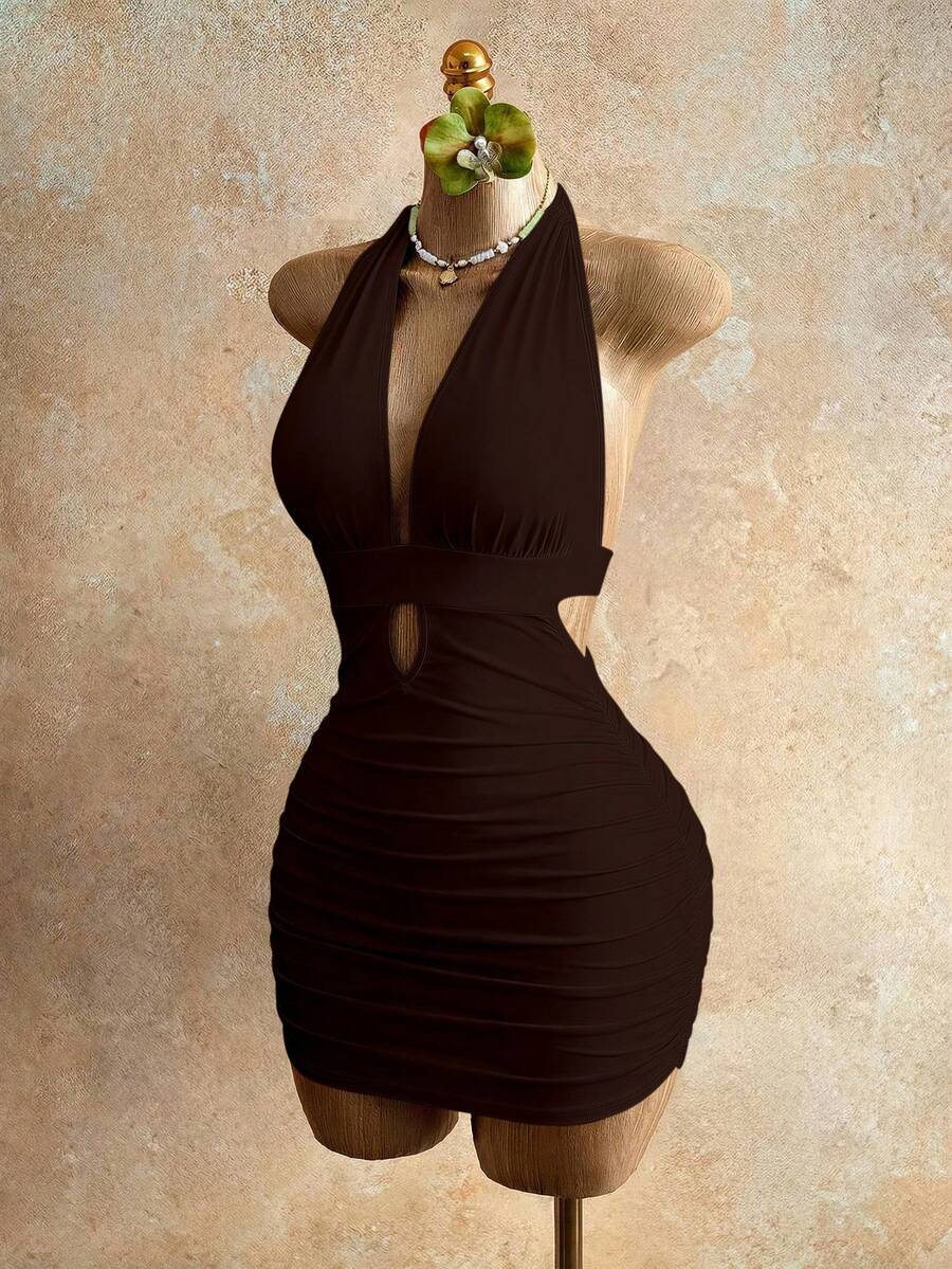 Sleeveless women's halter backless bodycon mini dress featuring lace-up knot back details and a high-waist pencil hem.