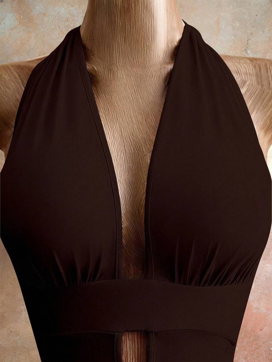 Sleeveless women's halter backless bodycon mini dress featuring lace-up knot back details and a high-waist pencil hem.