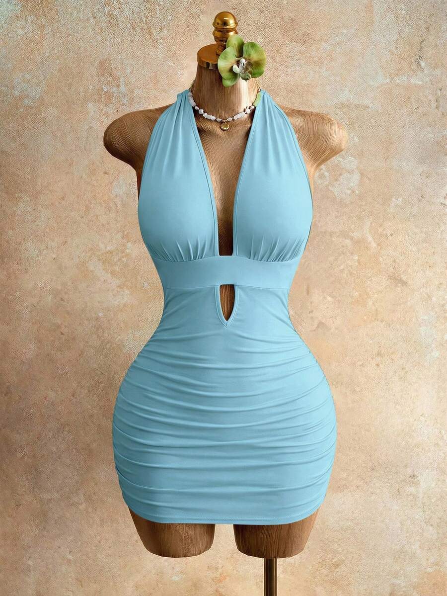 Sleeveless women's halter backless bodycon mini dress featuring lace-up knot back details and a high-waist pencil hem.