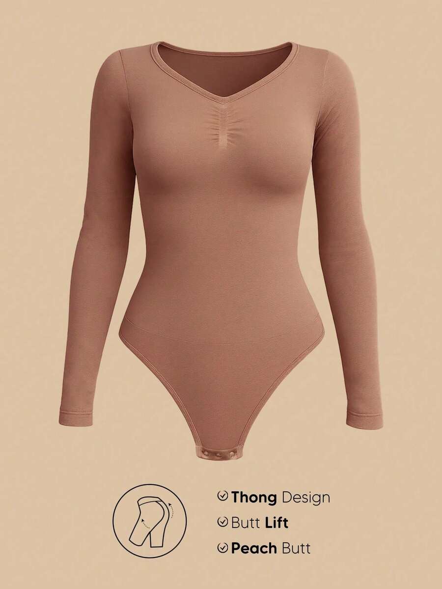 Women's long sleeve shapewear bodysuit featuring tummy control and waist training support