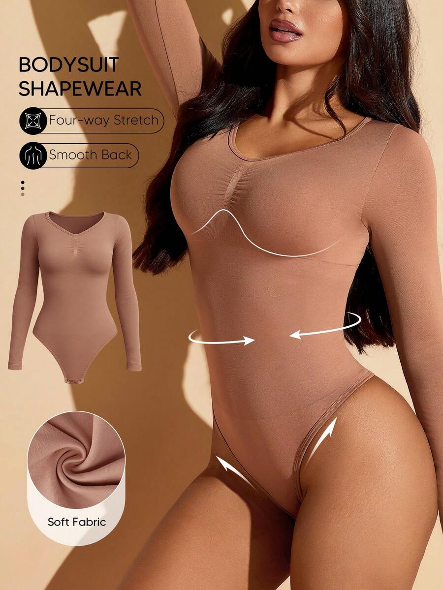 Women's long sleeve shapewear bodysuit featuring tummy control and waist training support
