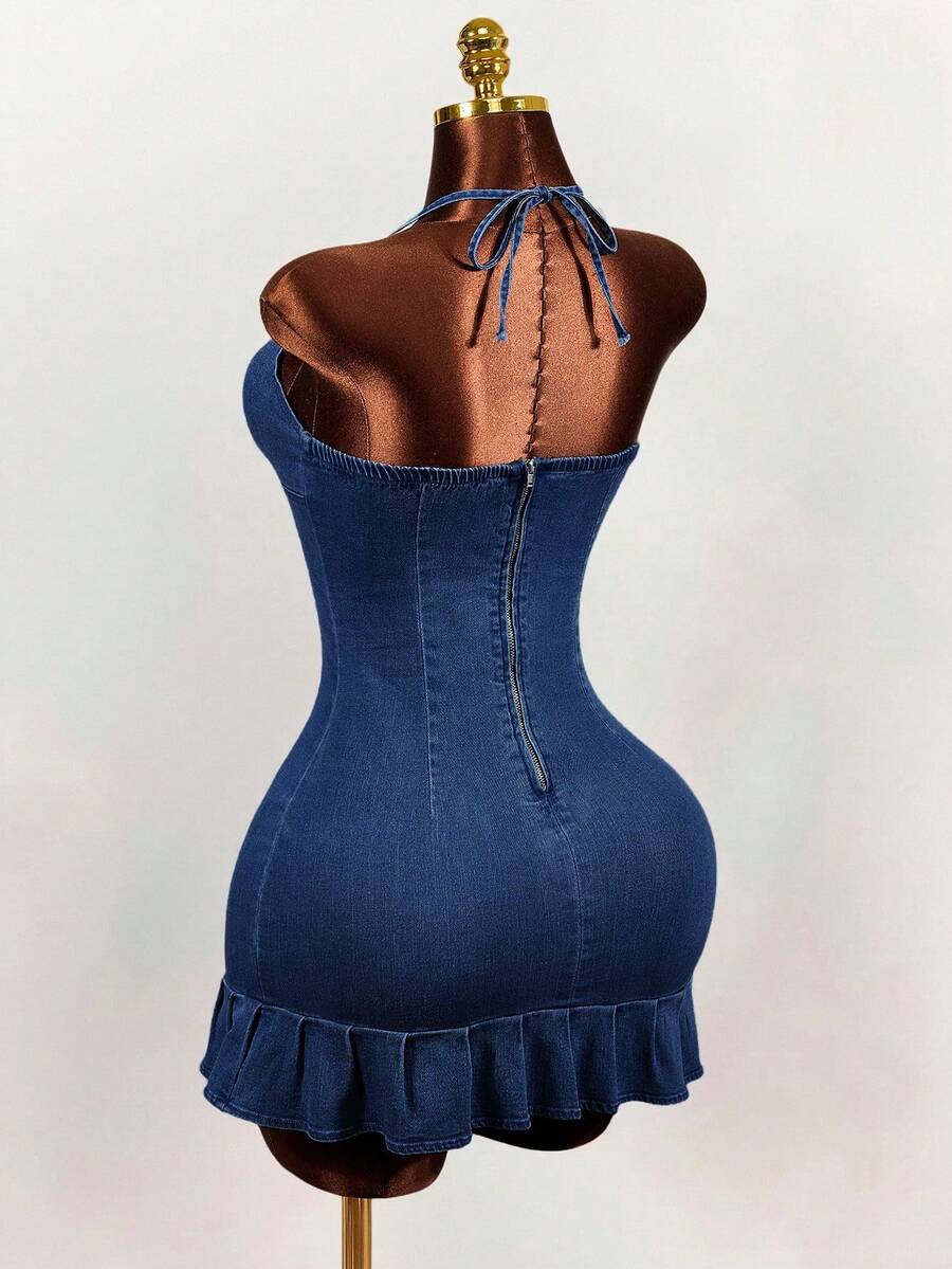 Women's blue denim halter mini dress featuring front cut-out details and a flounce ruffle hem.
