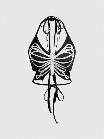 Black gothic halter crop tank top featuring a butterfly skeleton applique, front twist detail, and asymmetrical hem on slim-fit stretch fabric.