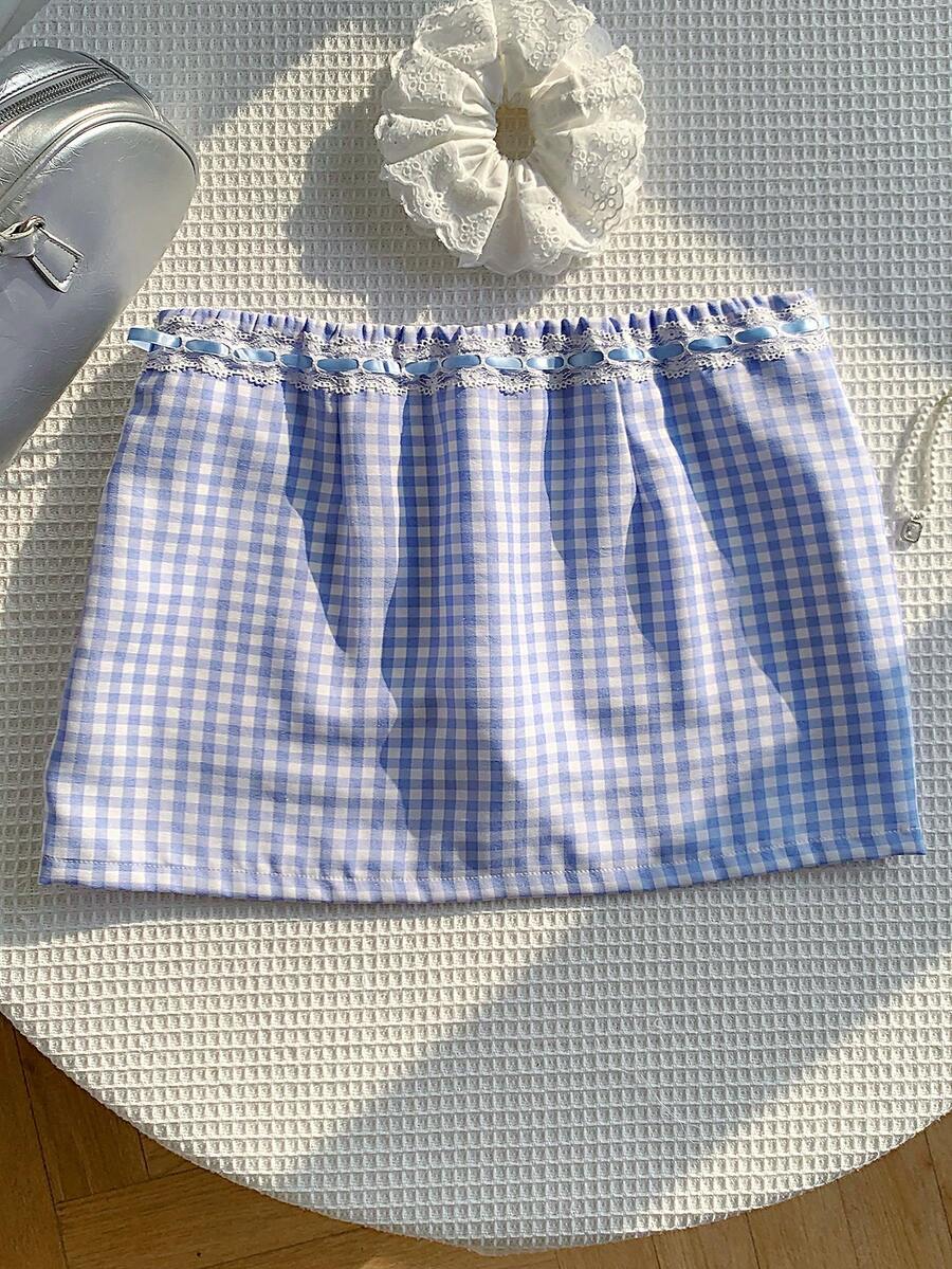 Women's white 100% cotton low waist mini skirt featuring a tropical print and zipper detail.