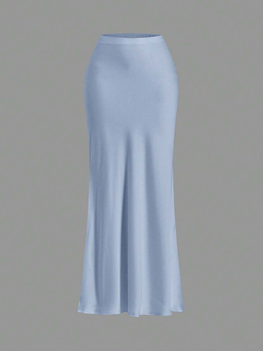 Women's black woven mermaid maxi skirt featuring a solid color design, mid waist, and 100% cotton fabric.