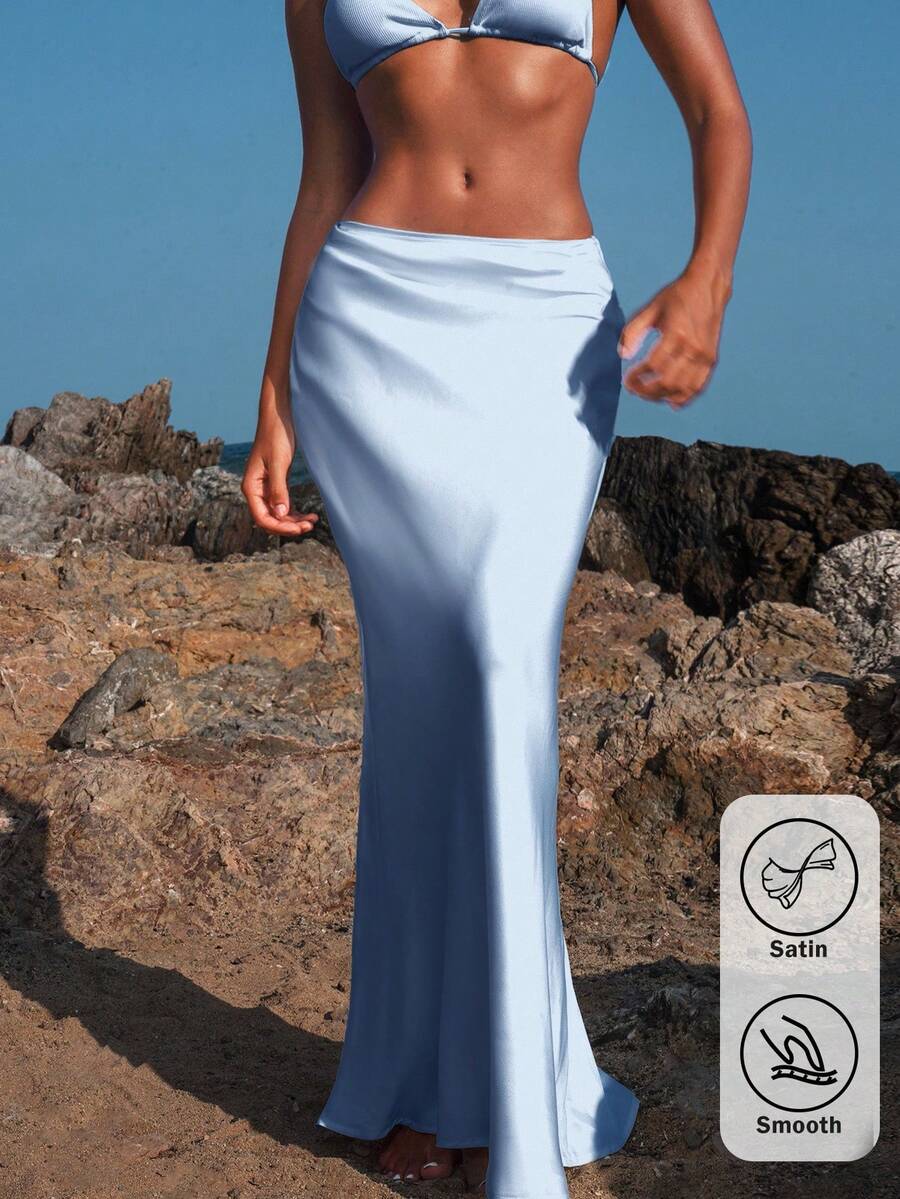Women's black woven mermaid maxi skirt featuring a solid color design, mid waist, and 100% cotton fabric.