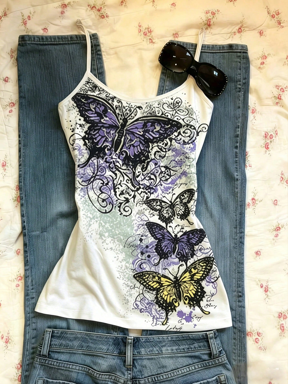 Burgundy cross pattern camisole top featuring spaghetti straps, ring accent, and a backless slim fit design.