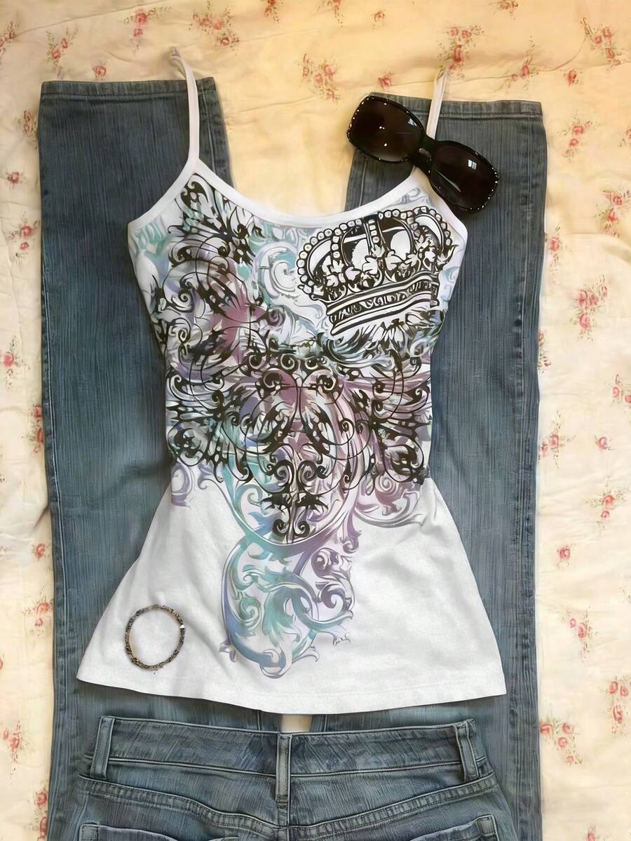Burgundy cross pattern camisole top featuring spaghetti straps, ring accent, and a backless slim fit design.