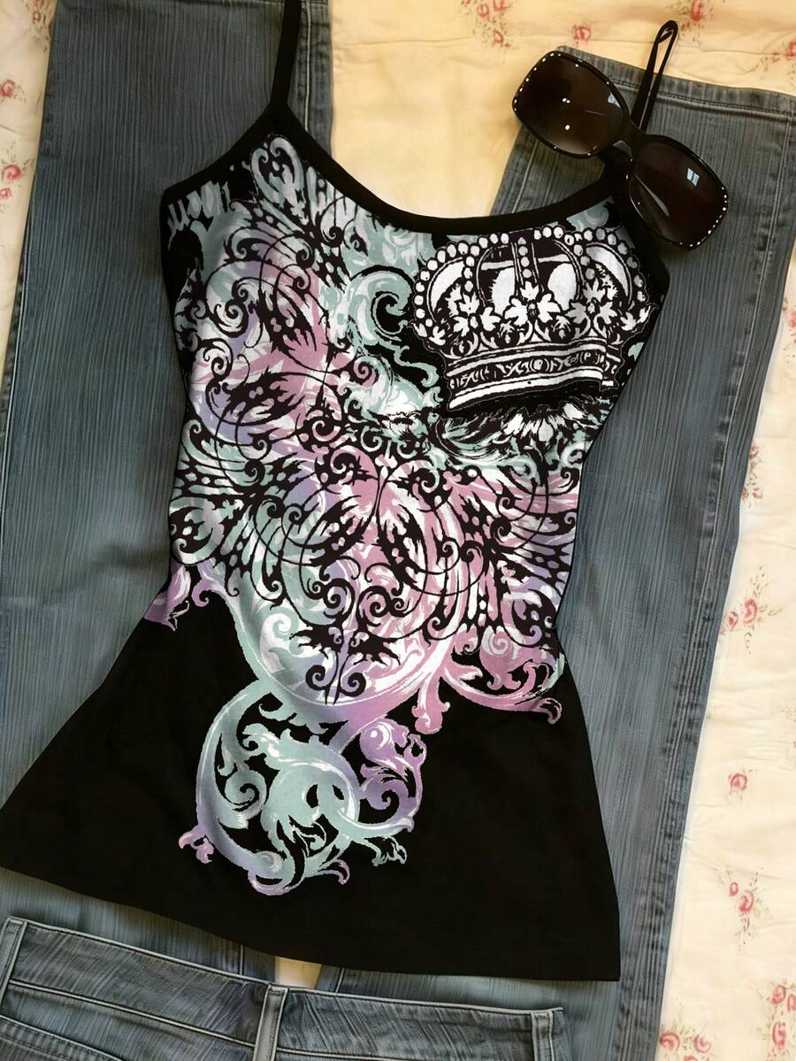 Burgundy cross pattern camisole top featuring spaghetti straps, ring accent, and a backless slim fit design.