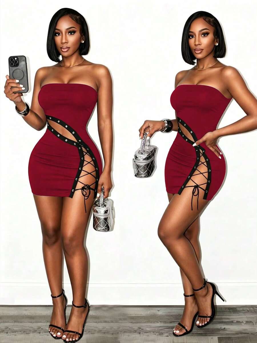 Women's black strapless bodycon mini dress featuring an asymmetrical lace-up design with grommet eyelets and a slim pencil fit.
