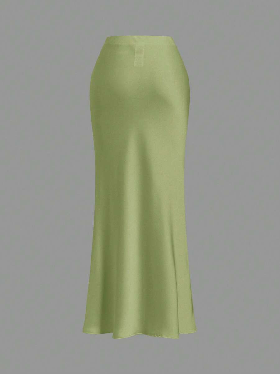 Women's black woven mermaid maxi skirt featuring a solid color design, mid waist, and 100% cotton fabric.