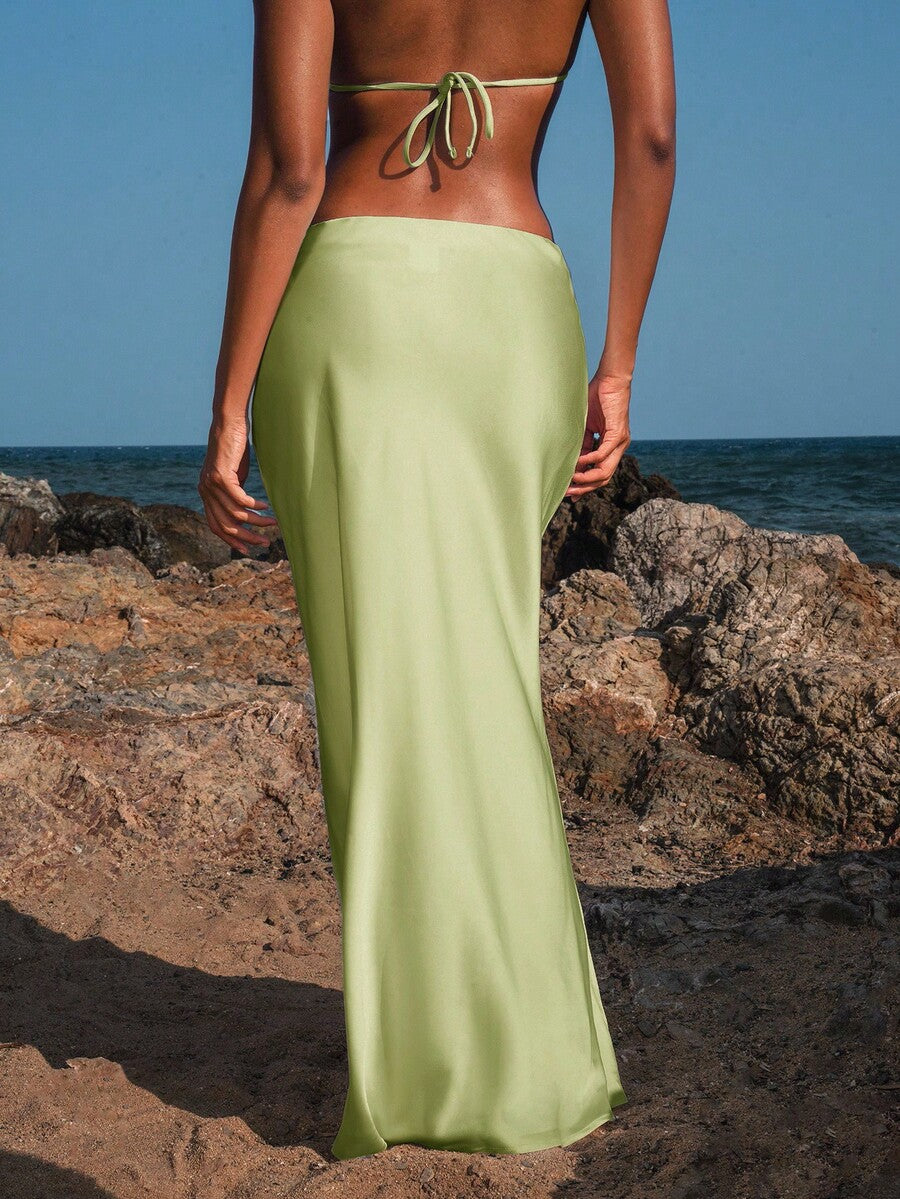 Women's black woven mermaid maxi skirt featuring a solid color design, mid waist, and 100% cotton fabric.