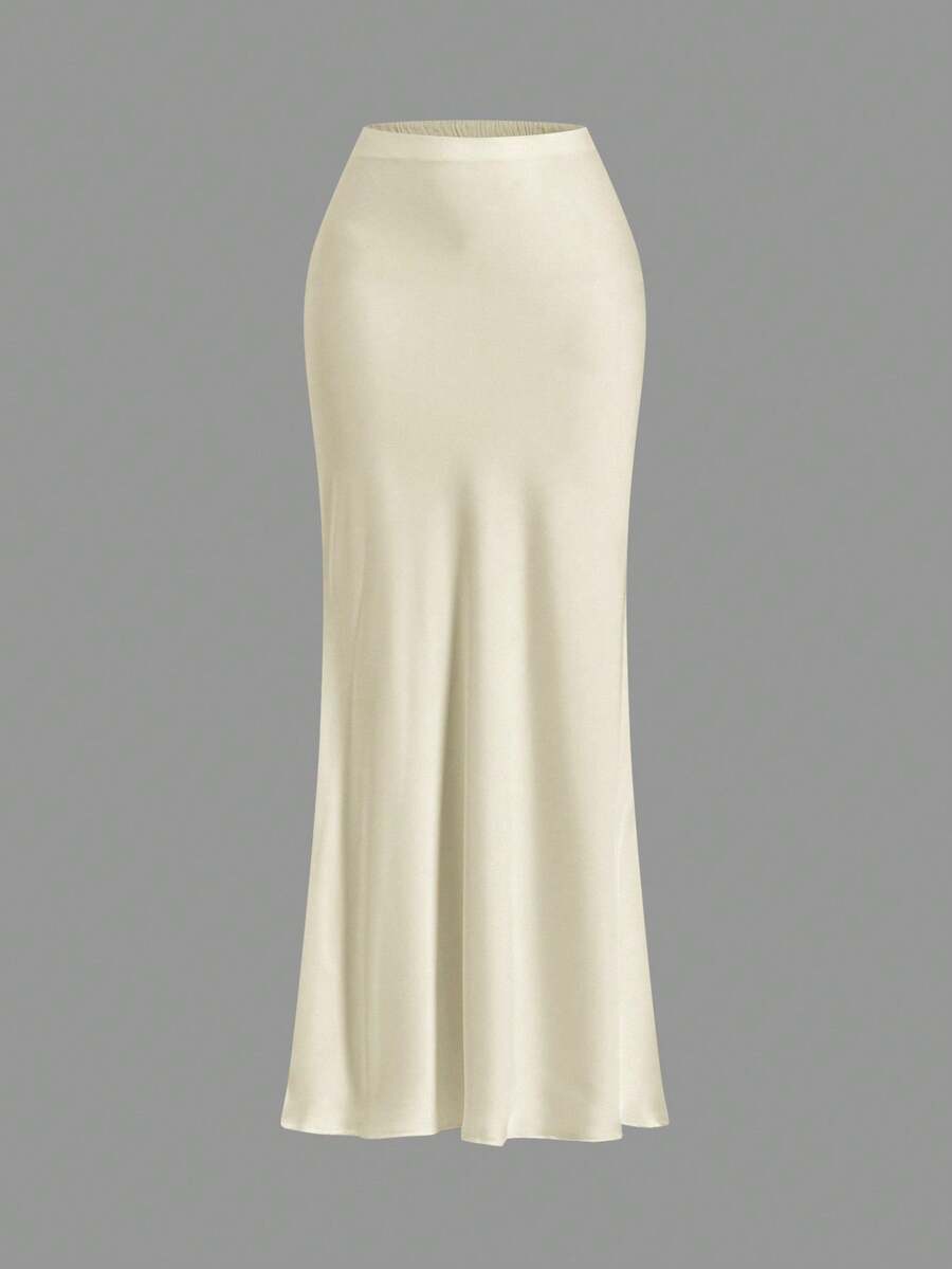 Women's black woven mermaid maxi skirt featuring a solid color design, mid waist, and 100% cotton fabric.