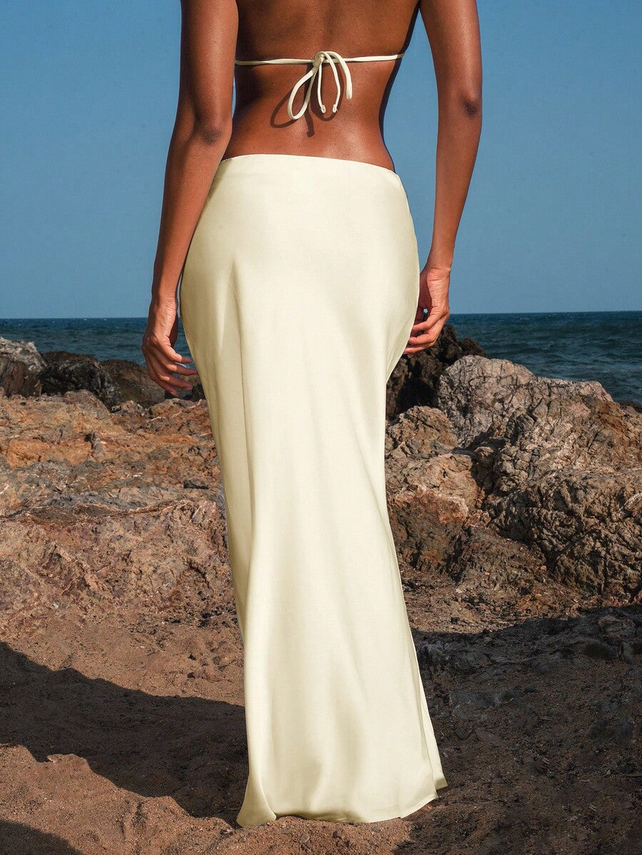Women's black woven mermaid maxi skirt featuring a solid color design, mid waist, and 100% cotton fabric.