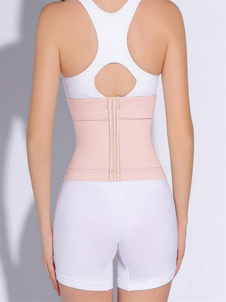 Black adjustable waist cincher shapewear for women made of high stretch knitted fabric for tummy and waist control.
